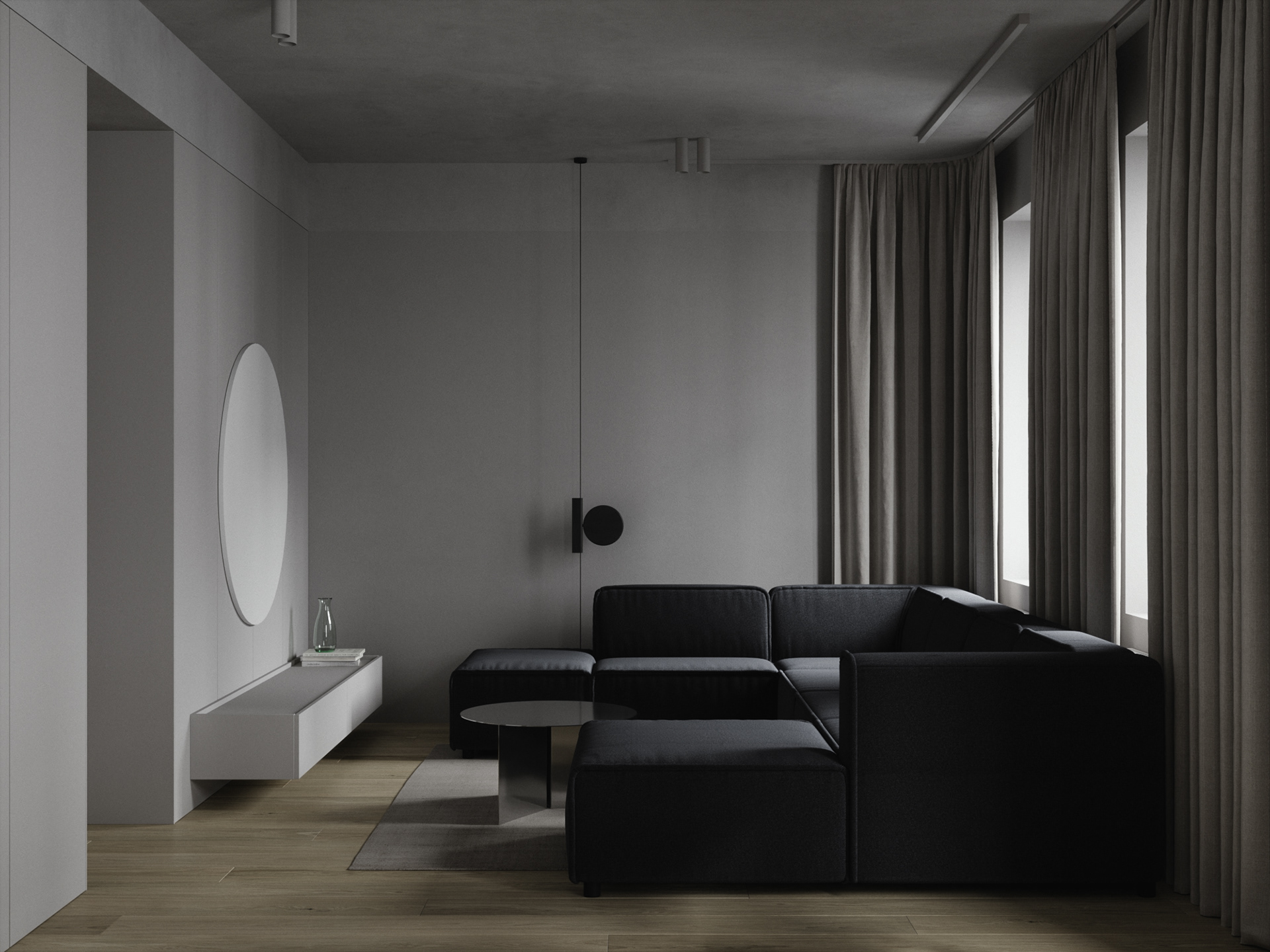 简约的客厅空间，因为白色墙面和黑色沙发的存在，奠定了沉静素雅的视感基调。