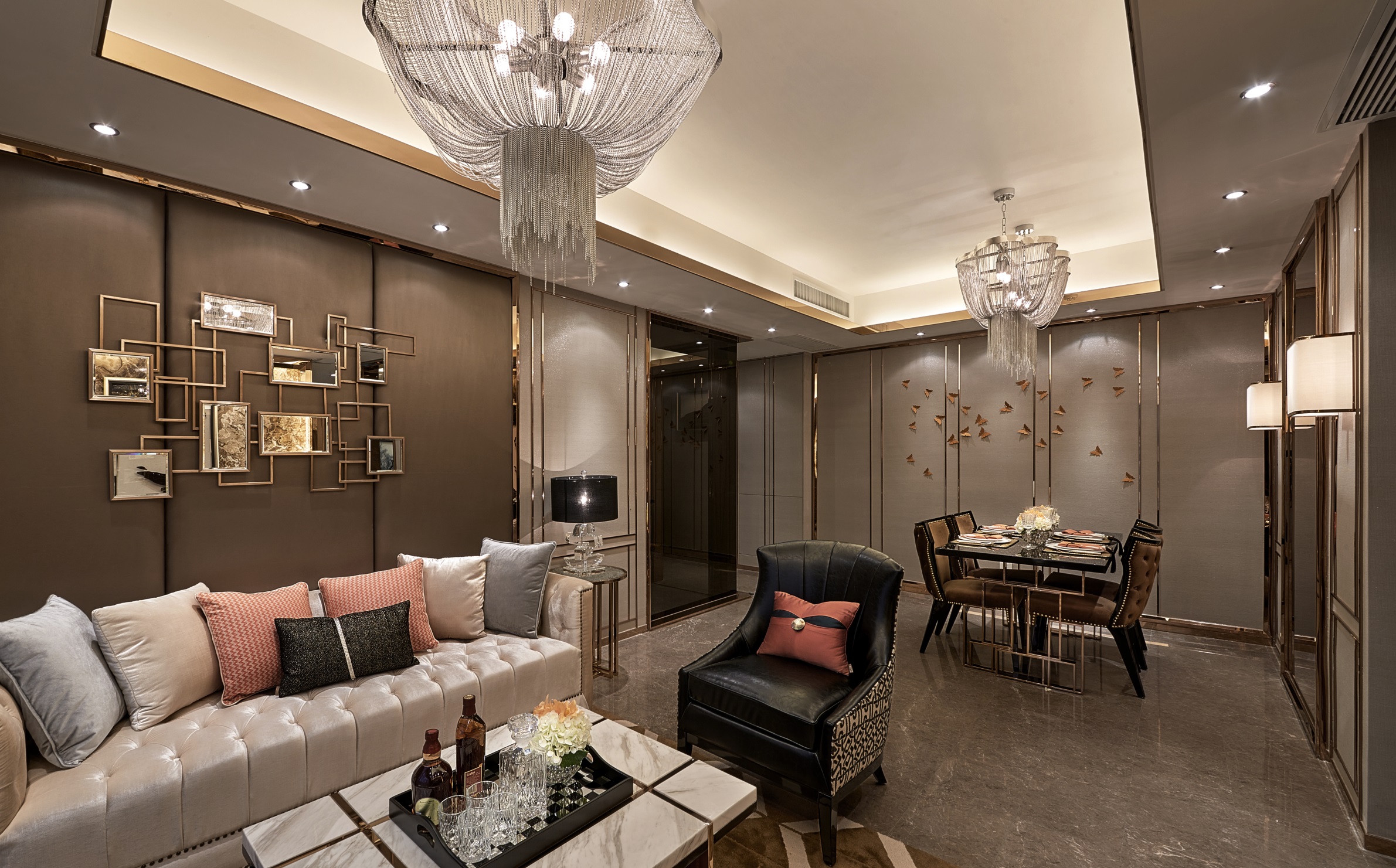 客厅咖色护墙板与白色绒质沙发相互呼应，使整体空间呈现出简约且典雅的感觉。