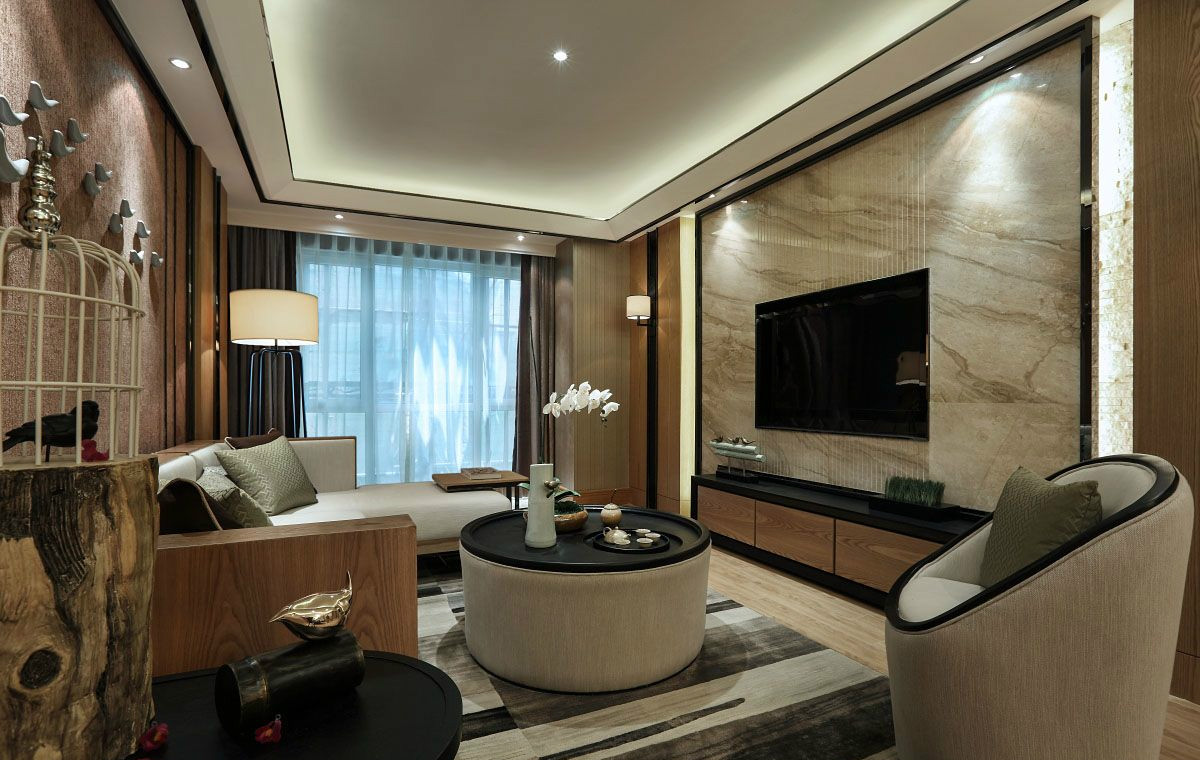 客厅布局方正，舒适的沙发设计配以大理石电视墙，以简洁的线条勾勒优雅空间。