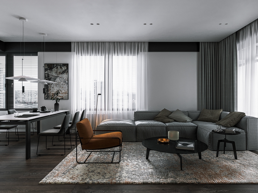 客厅墙面以白色为主，搭配文雅朴素的灰色沙发，演绎出清新恬淡的空间氛围。