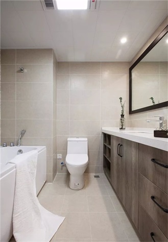 卫浴间利用暖色，创造出属于业主的慢生活格调，空间显得温雅而舒适。
