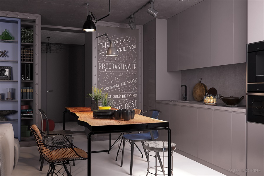 厨房在餐厅一侧，灰色橱柜赋予空间简净而通透的气质，营造出优雅大气的空间效果。