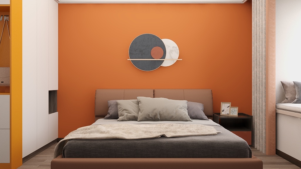 侧卧营造出舒适和静谧的氛围，橘色背景墙设计干练大气，轻奢氛围浓郁。