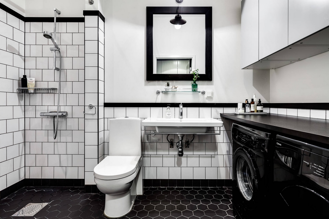 卫浴间采用黑白配色，动线规划有序，一种放松自在的氛围油然而生。