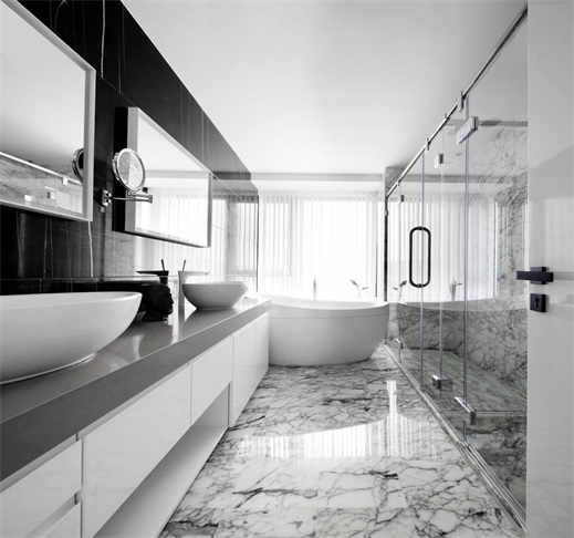 卫生间采用白色大理石渲染，中部采用玻璃进行干湿分离，为空间添上一笔宁静。