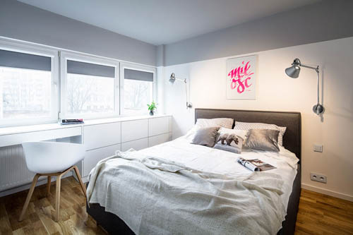 卧室则选用灰白色，达到舒适轻松的氛围。