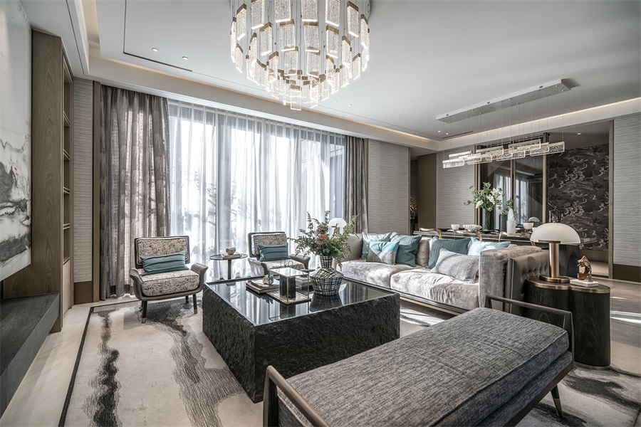 优雅的客厅配色，配以舒适的软装铺叙，使得空间呈现出俊雅悠然的时尚气息。