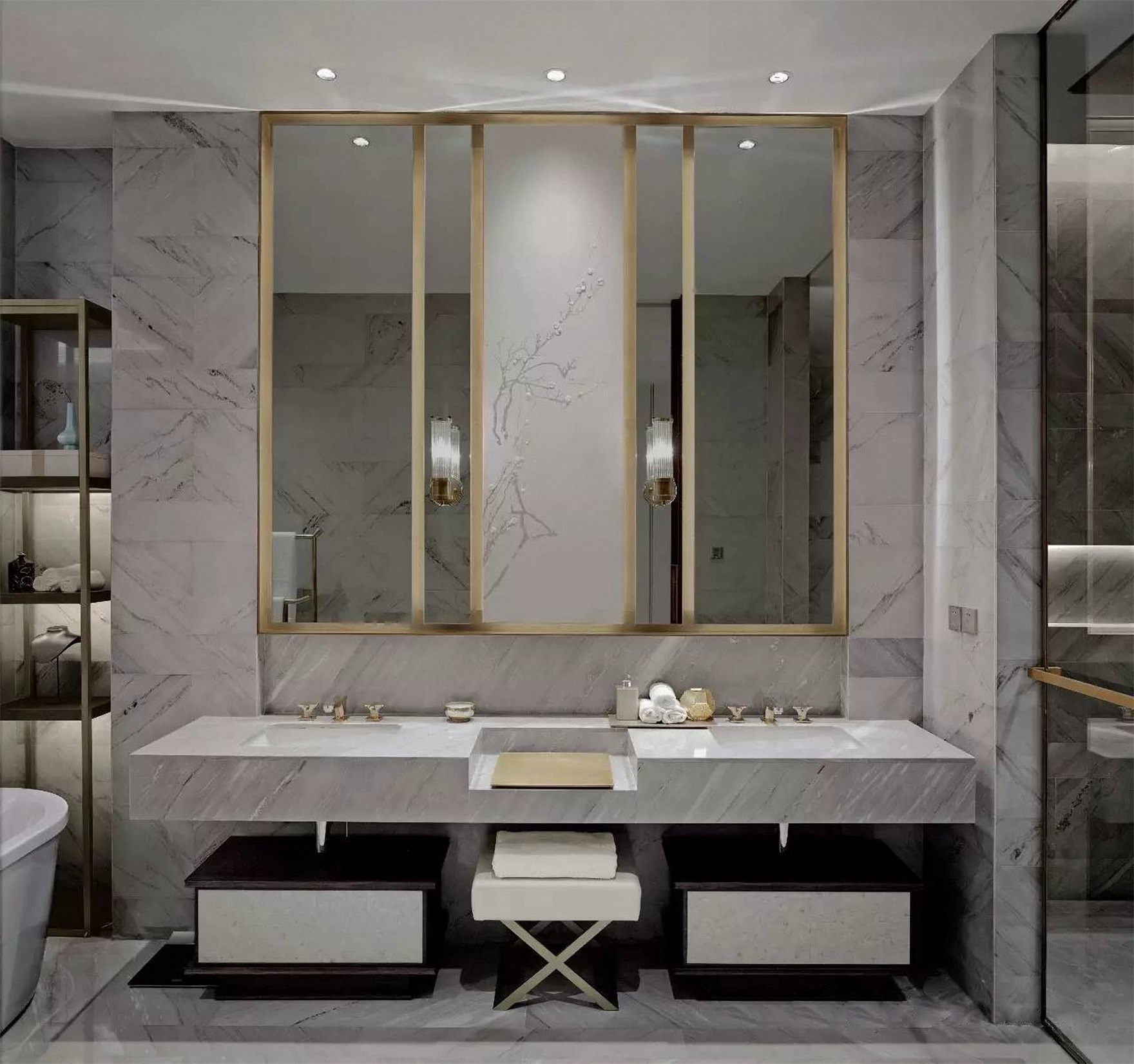 卫浴空间以白色大理石为基调，洗手台局部使用金属线条勾勒，使空间更有层次感。