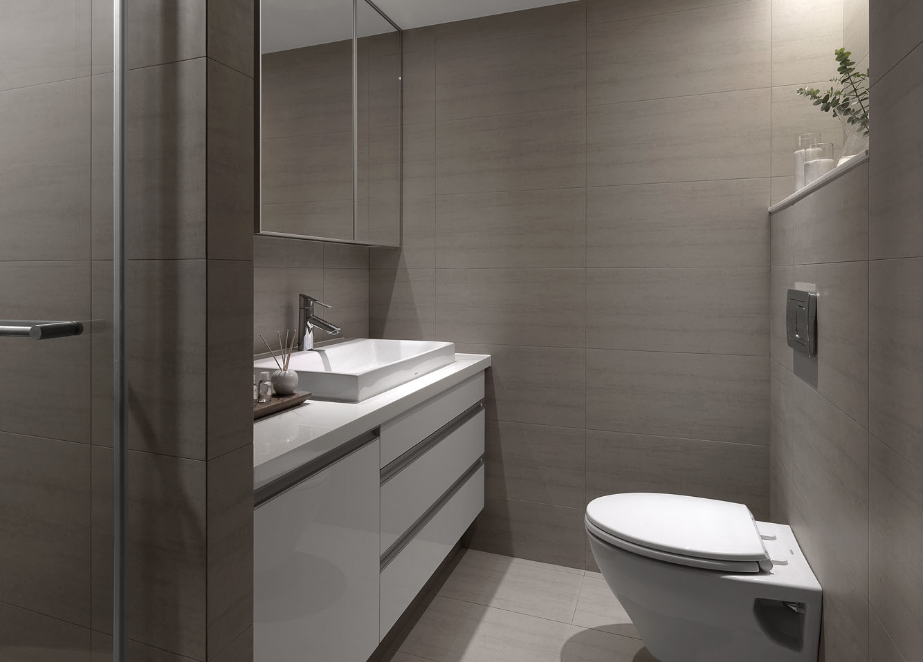浅咖色基调的卫浴空间烘托出舒适氛围，白色洁具提高了视觉美观度。