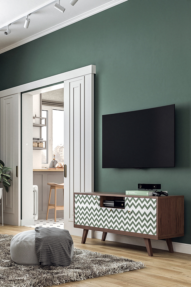 背景墙沿用绿色背景，地柜设计时尚，电视机采用挂式设计，营造出独特的时尚气质。