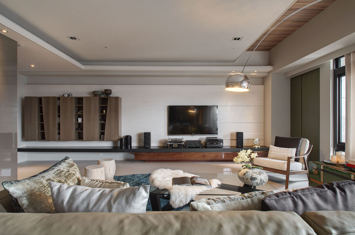现代范客厅设计，整体以素色为主，布艺沙发聚拢感强，显得格外的简雅大方。