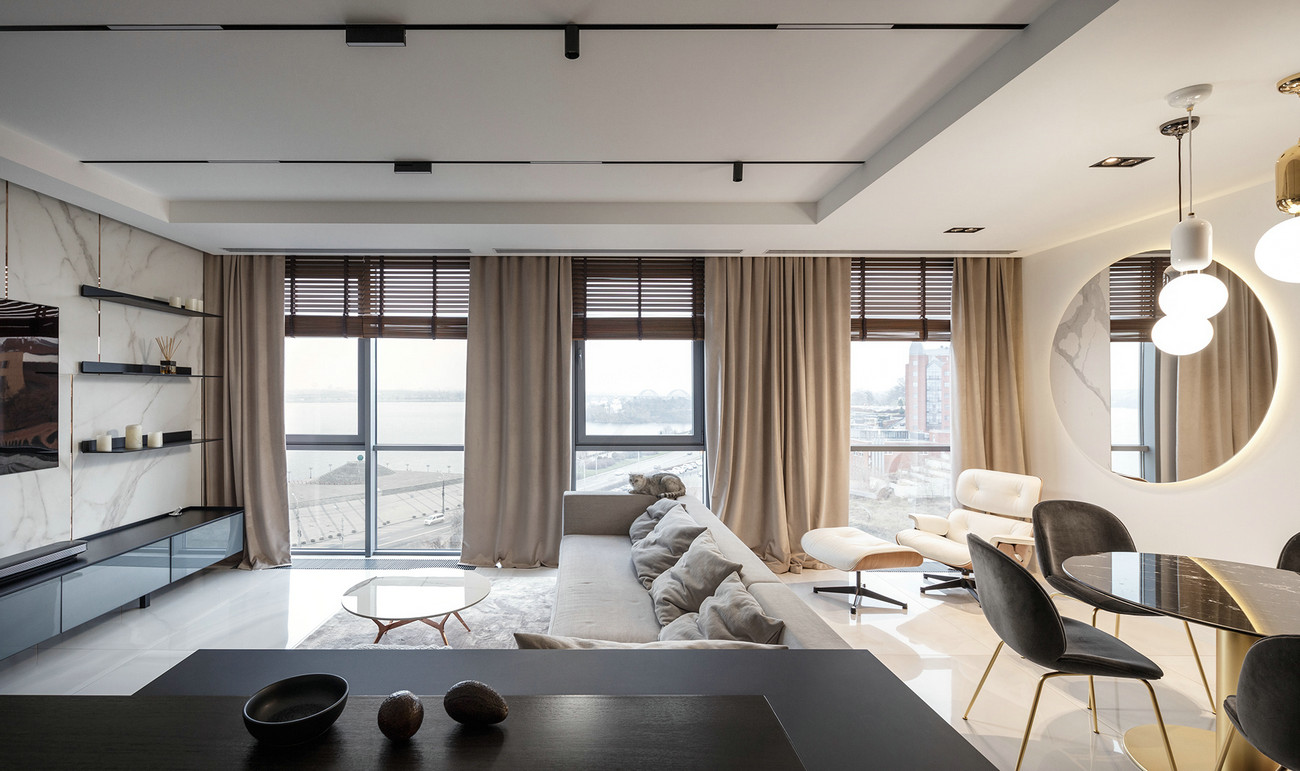 客厅整体以现代简约风格为主，简洁大方，布艺沙发用做空间隔断。