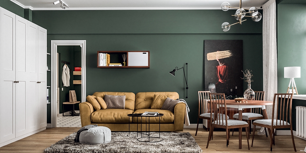 绿色作为客厅的主调，从色彩给人以时尚感，局部橘色沙发点缀，视觉对比强烈。