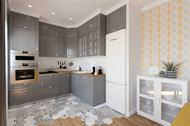 简单的墙面处理，配以灰色橱柜，简约优雅，塑造出明亮轻柔的烹饪空间。