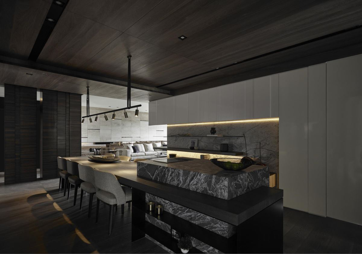 厨房餐厅一体化设计，墙面的造型使空间更具层次感，岛屿延伸为餐厅，高度利用了空间面积。